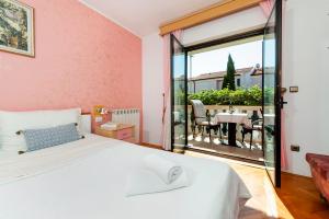 Ein Bett oder Betten in einem Zimmer der Unterkunft Villa Allegria