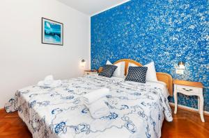 Ein Bett oder Betten in einem Zimmer der Unterkunft Villa Allegria