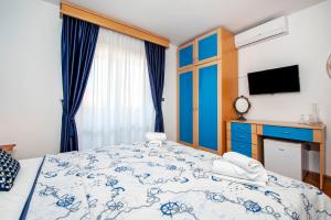 Ein Bett oder Betten in einem Zimmer der Unterkunft Villa Allegria