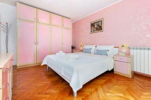 Ein Bett oder Betten in einem Zimmer der Unterkunft Villa Allegria