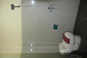Kylpyhuone majoituspaikassa Asher Bali Transit