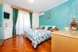 Ein Bett oder Betten in einem Zimmer der Unterkunft Villa Allegria