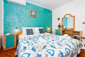 Ein Bett oder Betten in einem Zimmer der Unterkunft Villa Allegria