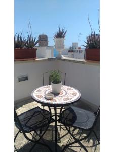 A balcony or terrace at B&B DIMORA PALMIERI