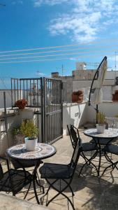 A balcony or terrace at B&B DIMORA PALMIERI