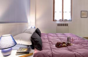 Posteľ alebo postele v izbe v ubytovaní GetTheKey Battisti Apartment