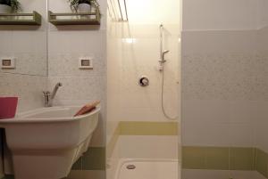Kúpeľňa v ubytovaní GetTheKey Battisti Apartment