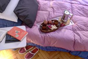 Posteľ alebo postele v izbe v ubytovaní GetTheKey Battisti Apartment
