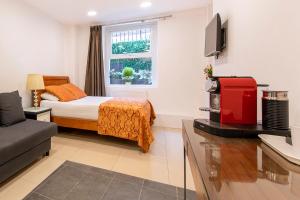 Postel nebo postele na pokoji v ubytování City Inn Russell Square