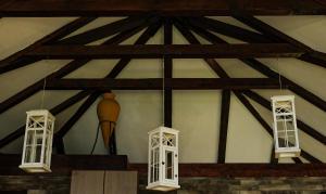 a ceiling with three windows and a light in a building at Dunavska Kuća in Smederevo