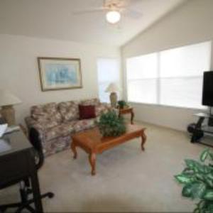 a living room with a couch and a coffee table at Mike & Christine's West Haven Vacation Home in Davenport