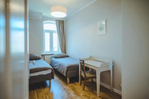 Posteľ alebo postele v izbe v ubytovaní Hampton Beach, Seaview