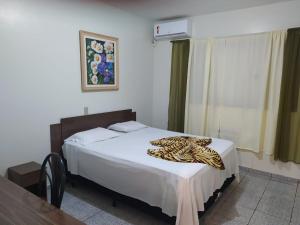 Postel nebo postele na pokoji v ubytování Hotel Gran Fenícia Marechal