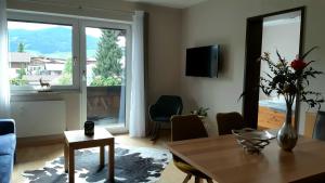 A television and/or entertainment centre at Appartement Miran by Miha