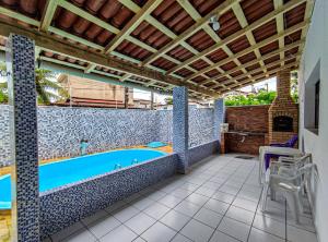 Swimmingpoolen hos eller tæt på Casa Em Pirangi Praia - RN