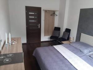 Postel nebo postele na pokoji v ubytování Apartmán pod hradem