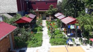 an overhead view of a garden with red roofs at Guest House 293 in K'obulet'i