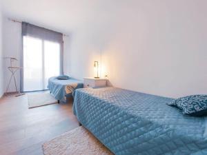 Posteľ alebo postele v izbe v ubytovaní Apartamento a 1 minuto de la playa