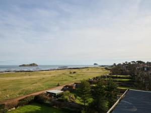 an aerial view of a beach and the ocean at Marine North Berwick in North Berwick
