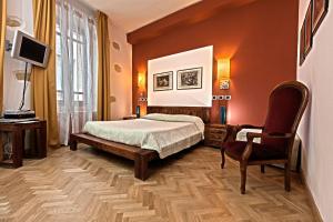 TV a/nebo společenská místnost v ubytování Maison Savoia B&b Apartment