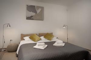 Posteľ alebo postele v izbe v ubytovaní Villa Kalu 2 + 23 fotografií