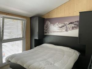 Postel nebo postele na pokoji v ubytování Villa Kreischberg