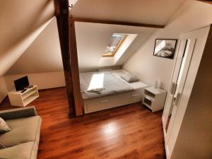 Posteľ alebo postele v izbe v ubytovaní Hotel Pod Kokšínem