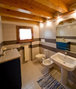 Koupelna v ubytování B&B Il Pettirosso + 7 fotografií