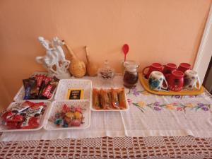 a table with food and other items on it at "Pivnica i smestaj Jovanovic"- Rogljevacke pivnice in Rogljevo