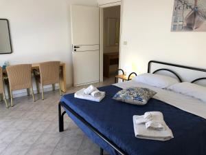 Katil atau katil-katil dalam bilik di NaturAmare Apartments Palinuro
