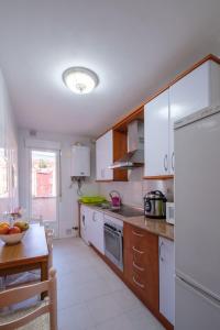 A kitchen or kitchenette at AguasBlancas VUT LE 446