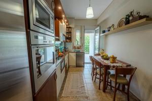 Η κουζίνα ή μικρή κουζίνα στο Karamba boutique living - ECO Riverside Appartment +17 φωτογραφίες