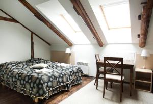 Postel nebo postele na pokoji v ubytování Art Hotell