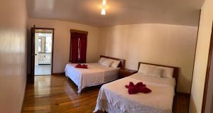 Tempat tidur dalam kamar di Coral View Beach Resort