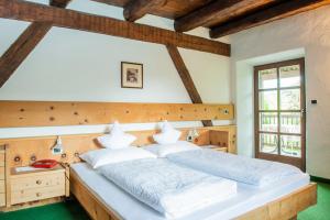 Postel nebo postele na pokoji v ubytování B&B Unterhabsbergerhof