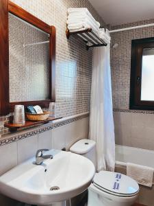 Koupelna v ubytování Hotel Valdevécar