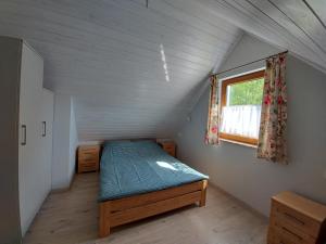 Postel nebo postele na pokoji v ubytování Domek u Kasi