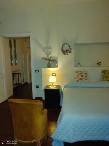 A bed or beds in a room at Casa Vacanza Villa Filomena