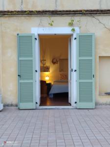 A bed or beds in a room at Casa Vacanza Villa Filomena