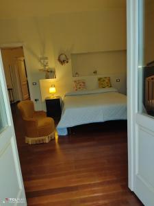 A bed or beds in a room at Casa Vacanza Villa Filomena