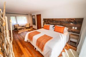 Postel nebo postele na pokoji v ubytování Rakau Lodge