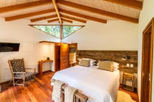 Postel nebo postele na pokoji v ubytování Rakau Lodge