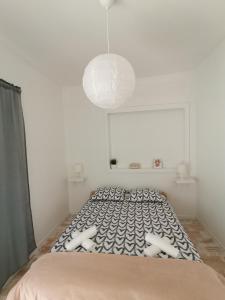 Postel nebo postele na pokoji v ubytování Ema & Mila 2 + 2 fotografie