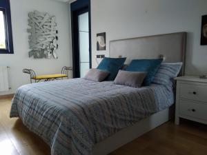 Postel nebo postele na pokoji v ubytování Olas Deluxe Salinas