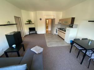 Kuchyň nebo kuchyňský kout v ubytování Apartmány U Muzea
