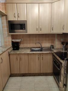 A kitchen or kitchenette at Apartamento Bolnuevo (Mazarrón)
