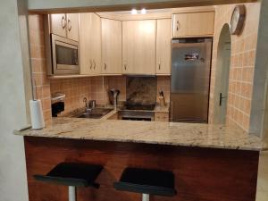 A kitchen or kitchenette at Apartamento Bolnuevo (Mazarrón)