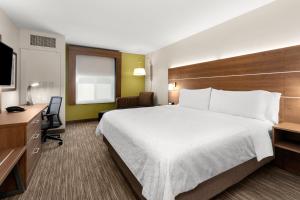 Postel nebo postele na pokoji v ubytování Holiday Inn Express and Suites Sumner by IHG