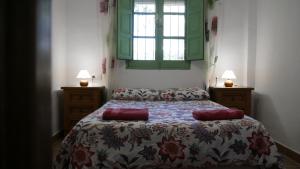 Posteľ alebo postele v izbe v ubytovaní EL ALFOLI. CASA RURAL CERCA DEL MAR