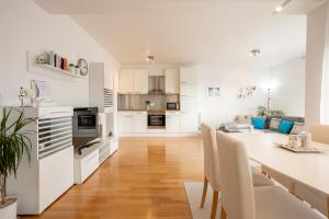 Kuchyňa alebo kuchynka v ubytovaní Apartman Aqua